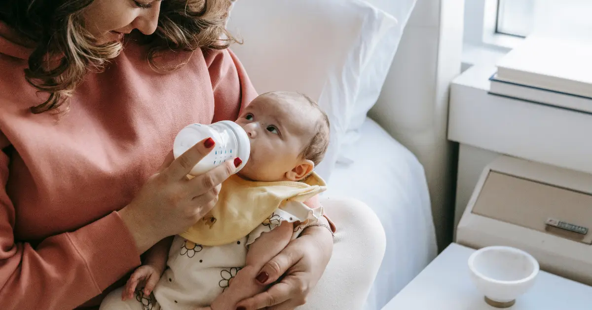 Bottle-feeding your baby is a great way to ensure they get the nutrition they need, whether you’re using formula or expressed breast milk. Here’s a simple, step-by-step guide to help you bottle-feed your baby successfully. Getting Ready to Bottle-Feed Choose the Right Bottle and Nipple There are many types of bottles and nipples available. Choose one that is the right size and flow for your baby’s age and needs. Some babies prefer certain shapes or materials, so you might need to try a few before finding the perfect fit. Sterilize the Bottles Before the first use, sterilize all bottles, nipples, and any other feeding equipment. You can do this by boiling them in water for 5 minutes or using a sterilizing machine. After the first use, wash them in hot, soapy water or in the dishwasher. Prepare the Formula or Breast Milk If you’re using formula, follow the instructions on the package carefully. Use the correct amount of water and powder. If you’re using expressed breast milk, make sure it’s properly stored and warmed to body temperature. Feeding Your Baby Find a Comfortable Position Hold your baby in a semi-upright position, supporting their head. This position helps prevent choking and makes it easier for them to swallow. You can use a pillow to support your arm and make feeding more comfortable. Test the Temperature Before feeding, test the milk’s temperature by dripping a little on your wrist. It should be warm, not hot. If it’s too hot, let it cool down before giving it to your baby. Offer the Bottle Gently touch the nipple to your baby’s lips. When they open their mouth, let them latch onto the nipple. Hold the bottle at an angle so the nipple fills with milk, not air. This helps prevent your baby from swallowing air, which can cause gas. Watch for Signs of Fullness Babies will show signs when they’re full. They might turn their head away, stop sucking, or push the bottle away. Pay attention to these signs and don’t force your baby to finish the bottle. Burping Your Baby When to Burp Burp your baby during and after feeding to help release any air they’ve swallowed. This can help prevent discomfort and spitting up. How to Burp There are a few ways to burp your baby: Over Your Shoulder: Hold your baby against your shoulder and gently pat or rub their back. Sitting Up: Sit your baby on your lap, supporting their chest and head with one hand, and pat or rub their back with the other. Lying Across Your Lap: Lay your baby face down across your lap, supporting their head, and gently pat or rub their back. Cleaning Up Wash the Bottles and Nipples After each feeding, wash all bottles, nipples, and feeding equipment in hot, soapy water or in the dishwasher. Let them air dry completely before storing. Sterilize Regularly Even if you wash them after each use, it’s a good idea to sterilize bottles and nipples regularly, especially for newborns. This helps keep them free from harmful bacteria. Tips for Successful Bottle-Feeding Hold Your Baby Close Bottle-feeding is a great time to bond with your baby. Hold them close, make eye contact, and talk to them softly. This helps them feel safe and loved. Follow Your Baby’s Cues Pay attention to your baby’s hunger and fullness cues. Feed them when they show signs of hunger and stop when they’re full. This helps them develop healthy eating habits. Keep Track of Feedings Keep a record of how much and how often your baby eats. This can help you notice any changes in their feeding patterns and ensure they’re getting enough nutrition. Stay Calm and Patient Bottle-feeding can take some time, especially at first. Stay calm and patient, and don’t rush the process. Your baby will sense your calmness and feel more relaxed. When to Ask for Help Talk to Your Pediatrician If you have any concerns about your baby’s feeding, growth, or health, don’t hesitate to talk to your pediatrician. They can provide guidance and support. Seek Support from Others Don’t be afraid to ask for help from family, friends, or a lactation consultant if you’re having trouble with bottle-feeding. They can offer valuable advice and encouragement. Conclusion Bottle-feeding your baby can be a rewarding experience for both of you. By following these steps and tips, you can ensure your baby gets the nutrition they need while enjoying the special time you share during feedings. Remember, every baby is different, so find what works best for you and your little one.